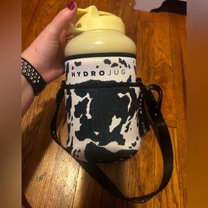 Yellow hydrojug with sleeve.